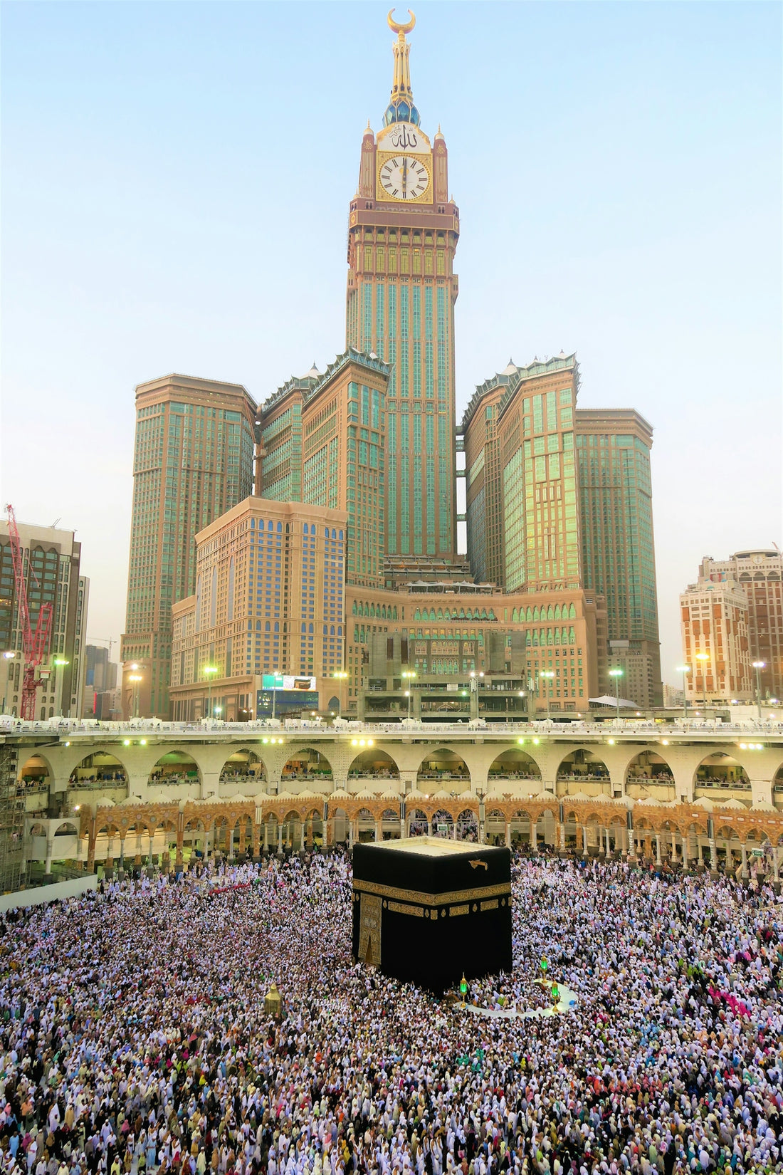 The Kaaba surrounded by a crowd of pilgrims in Mecca, Saudi Arabia