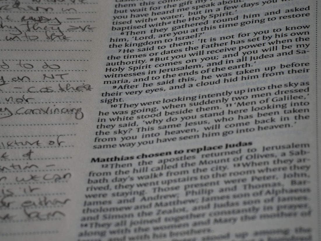 A close up of a book with writing on it