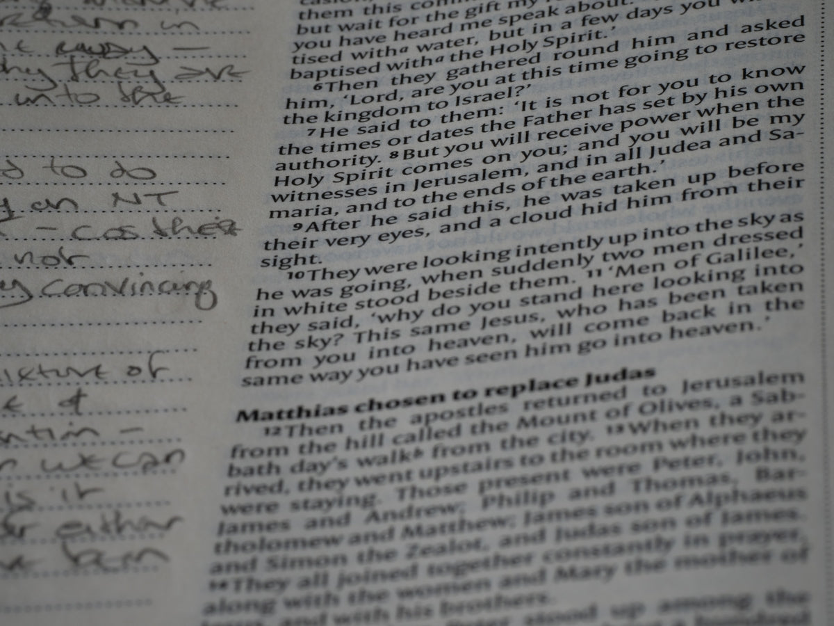 A close up of a book with writing on it